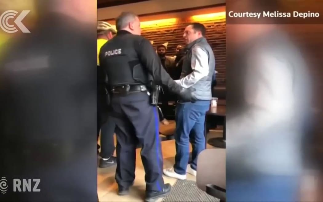 Protesters invade Starbucks after arrest of black men