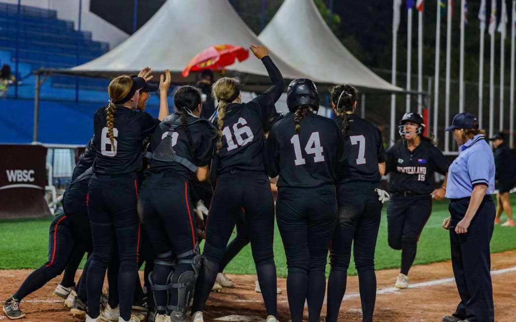 Maiarangi celebrates with her team following an automatic home-run against Czechia
