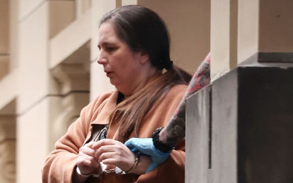 Convicted murderer Erin Patterson is escorted out of the Supreme Court of Victoria following the day's proceedings in a pre-sentencing hearing in Melbourne on 25 August, 2025.