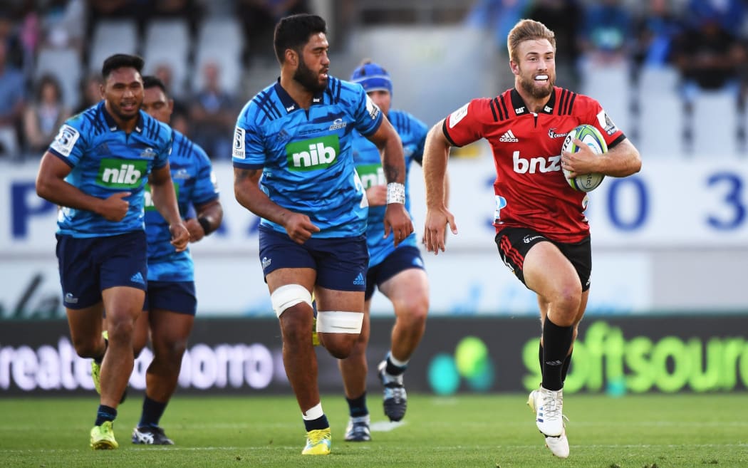 Crusaders centre Braydon Ennor hits the gas in his side's Super Rugby win over the Blues.