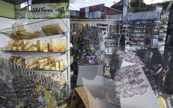 The main street of Kaikoura remains a ghost town, with most shops closed and merchandise everywhere.