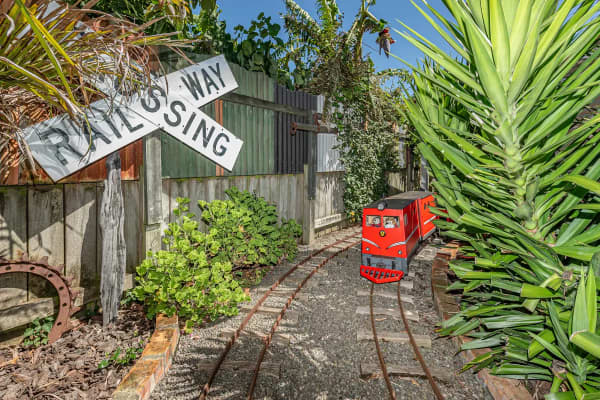 The property with working railway is now for sale.