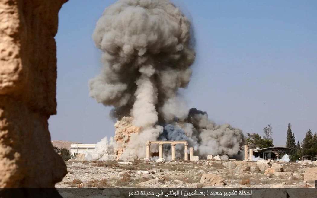 Islamic State has published images of the destruction of the Temple of Baalshamin at the ancient ruins of Palmyra in Syria.