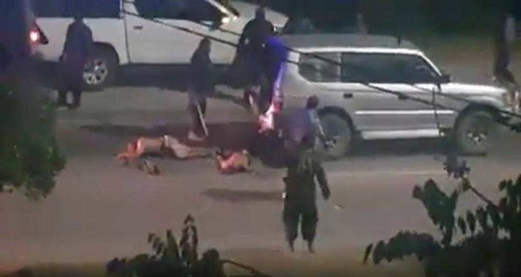 Screenshot of Papua New Guinean police officers violently beating three men on a street in Port Moresby, Papua New Guinea shared on social media on November 4, 2019.