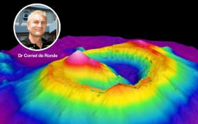 Voyage co-leader Cornel de Ronde superimposed on a 3D image of Brothers submarine volcano.