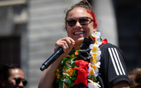 Fans celebrate the Black Ferns at an event at Parliament