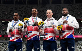 Silver medallists Britain's Chijindu Ujah, Zharnel Hughes, Richard Kilty, Nethaneel Mitchell-Blake, Tokyo Olympic men's 4x100m relay.