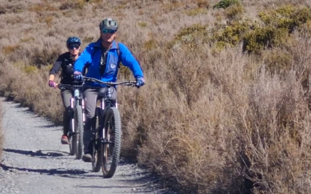Tourists biking out from the Tongariro Alpine Crossing