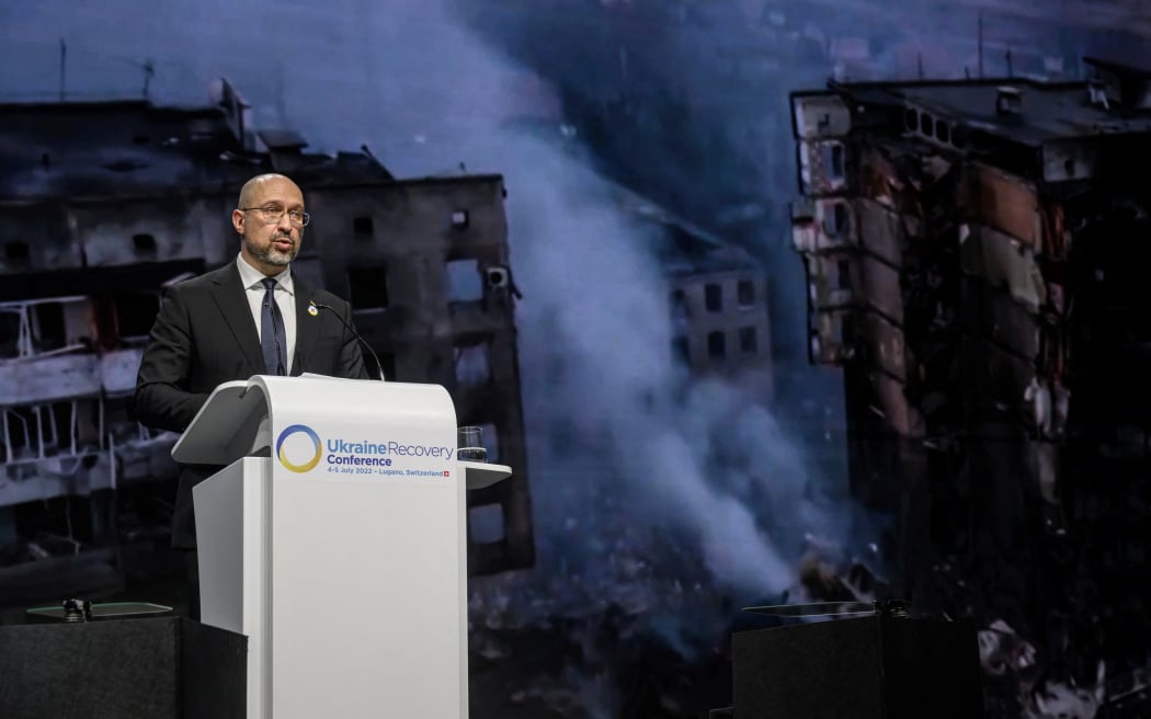 Ukraine's Prime Minister Denys Shmyhal delivers a speech at the start of a two-day International conference on reconstruction of Ukraine, in Lugano, Switzerland on 4 July 2022. Ministers from dozens of countries and organisations leaders gathered in Switzerland Monday to hash out a "Marshall Plan" to rebuild the war-torn country.