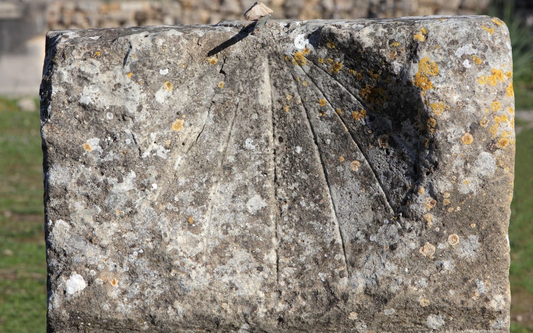 Sundial in the Forum or marketplace of Volubilis, Northern Morocco. Volubilis was founded in the 3rd century BC by the Phoenicians and was a Roman settlement from the 1st century AD. Volubilis was a thriving Roman olive growing town until 280 AD and was settled until the 11th century. The buildings were largely destroyed by an earthquake in the 18th century and have since been excavated and partly restored. Volubilis was listed as a UNESCO World Heritage Site in 1997. Picture by Manuel Cohen (Photo by Manuel Cohen / Manuel Cohen / Manuel Cohen via AFP)