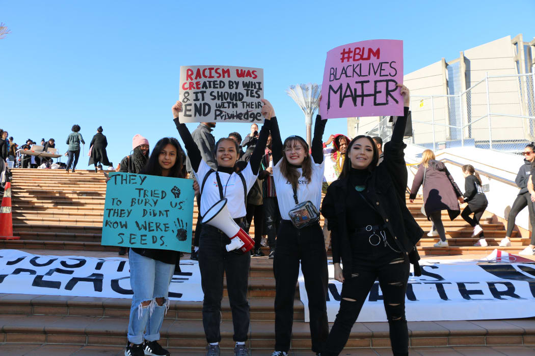 From left, Yizney Morale, Yibeth Morales, Cerys Evans and Manawa McLeod at the Black Lives Matter protest in Wellington.