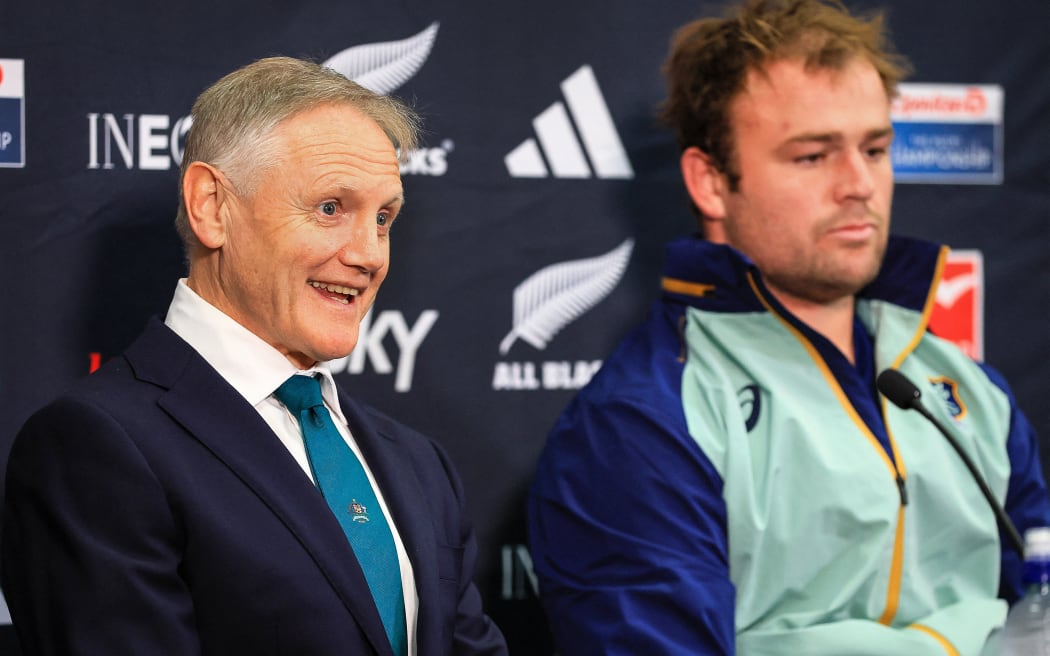 Australia's head coach Joe Schmidt (L) and Harry Wilson attend a press conference after The Rugby Championship and Bledisloe Cup match between New Zealand All Blacks and Australia Wallabies at Sky Stadium in Wellington on September 28, 2024. (Photo by Grant Down / AFP)