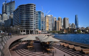 This picture shows a closed restaurant next to the harbour in Sydney on June 26, 2021, after authorities locked down several central areas of Australia's largest city to contain an outbreak of the highly contagious Delta variant