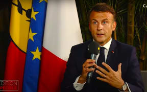 French President Emmanuel Macron speaks to local media pool just before leaving New Caledonia on 24 May 2024.