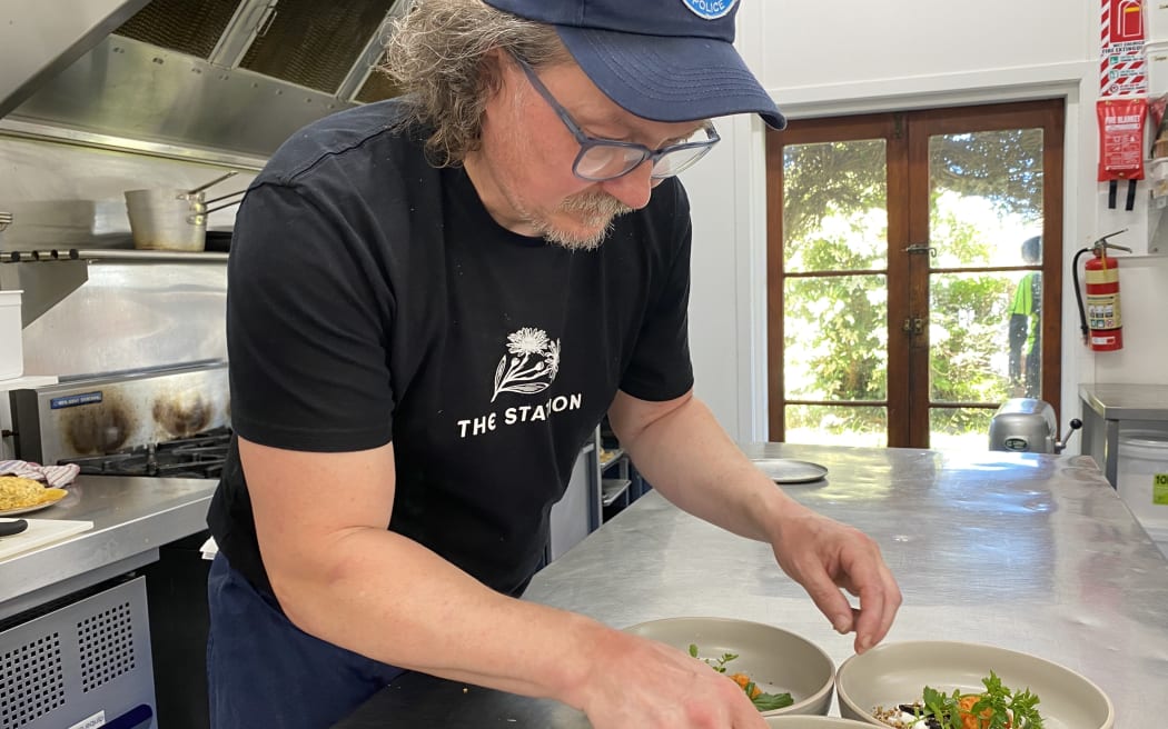 Chef Sam Wilson plating up at his new cafe at Waimarino National Park.