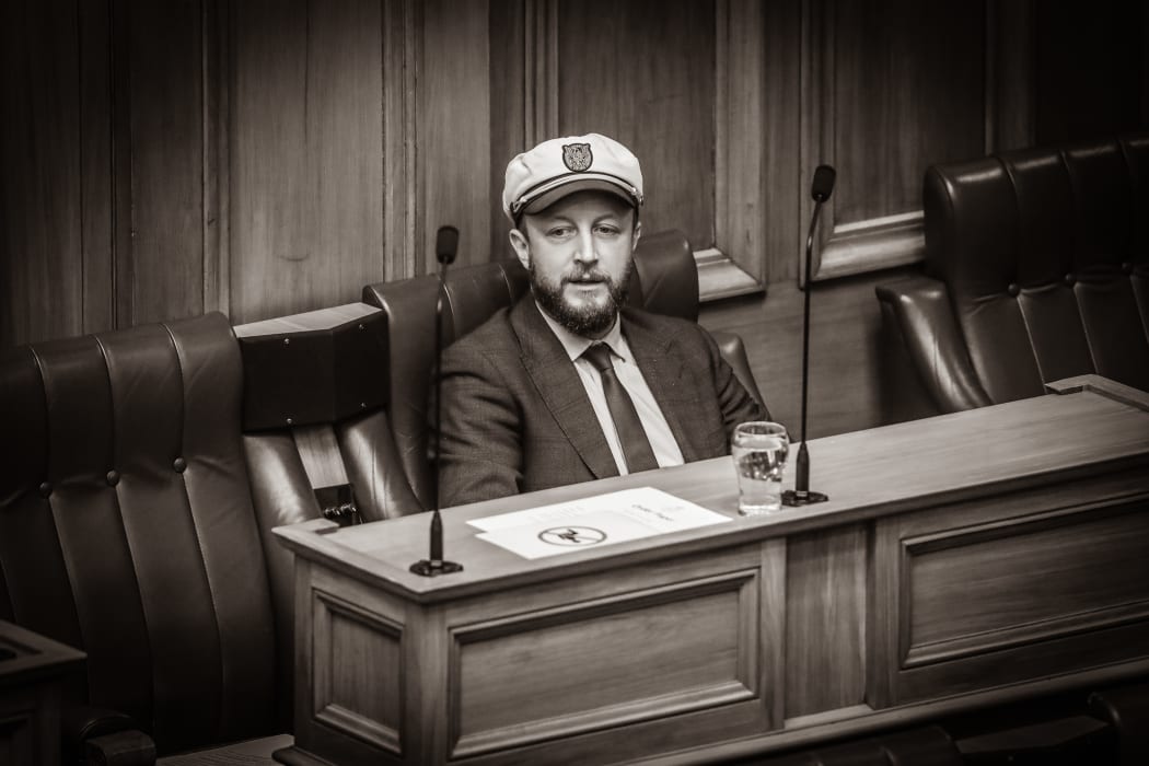 Labour's Chief Whip and cricket fan Kieran McAnulty goes ye olde parliament with a 'steady the ship' captains cap.