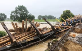 A derailed log train in Te Puke.