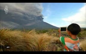 Mt Agung ash and rock eruptions close Bali airport
