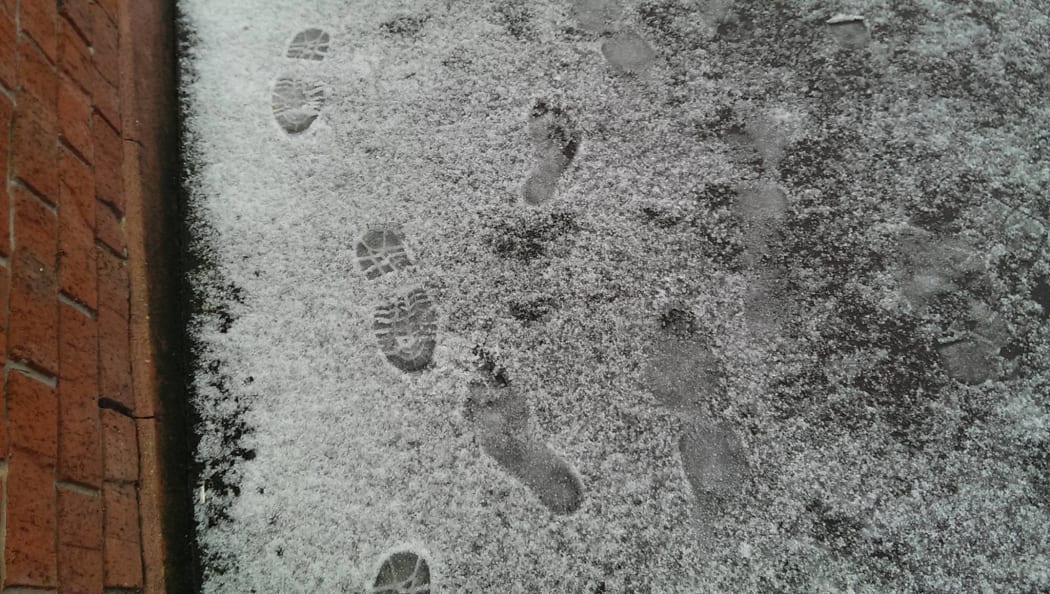Someone with bare feet was walking in the hail and snow in central Dunedin earlier today.