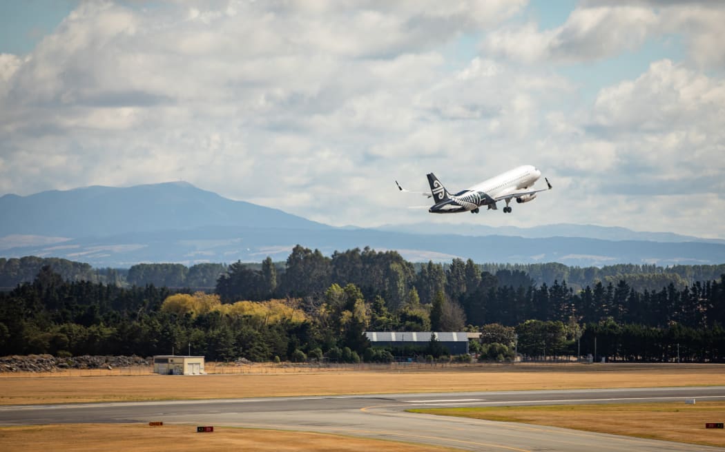 Air New Zealand plane taking off from Christchurch airport