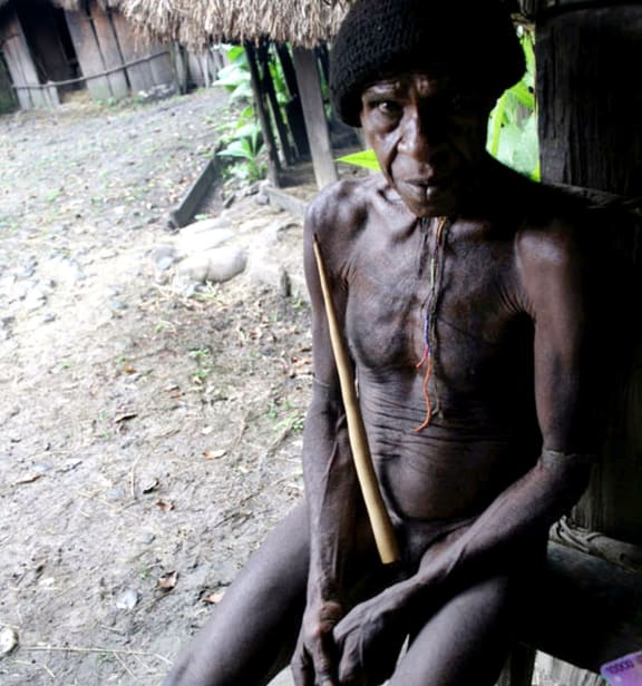 A man wearing a Papuan koteka