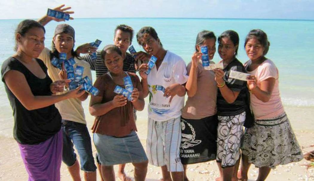 Kiribati Family Health Association youth volunteers promoting condom use