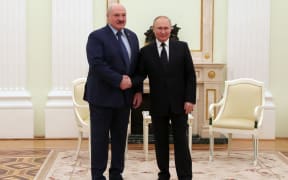 Belarus' President Alexander Lukashenko and Russian President Vladimir Putin at a meeting in Moscow. (The picture is supplied by Russian state-owned agency Sputnik).