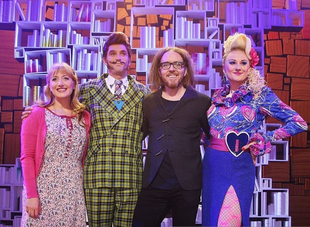 Elise McCann (L) with Matilda castmates and creator Tim Minchin