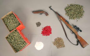 Drugs and firearms seized by police.