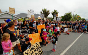 Hundreds turned out to protest the plan to change policing on the West Coast.