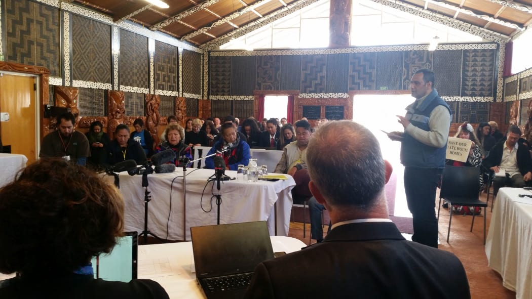 Hurimoana Dennis speaking to panel of MPs at Te Puea Marae
