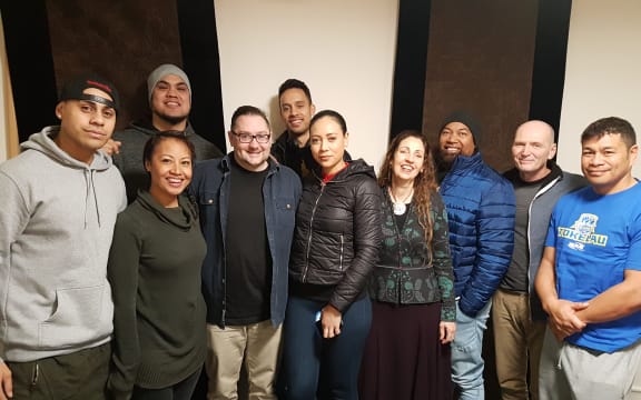 Members of Te Vaka, with Orchestra Wellington Marketing Manager Marek Peszynski.