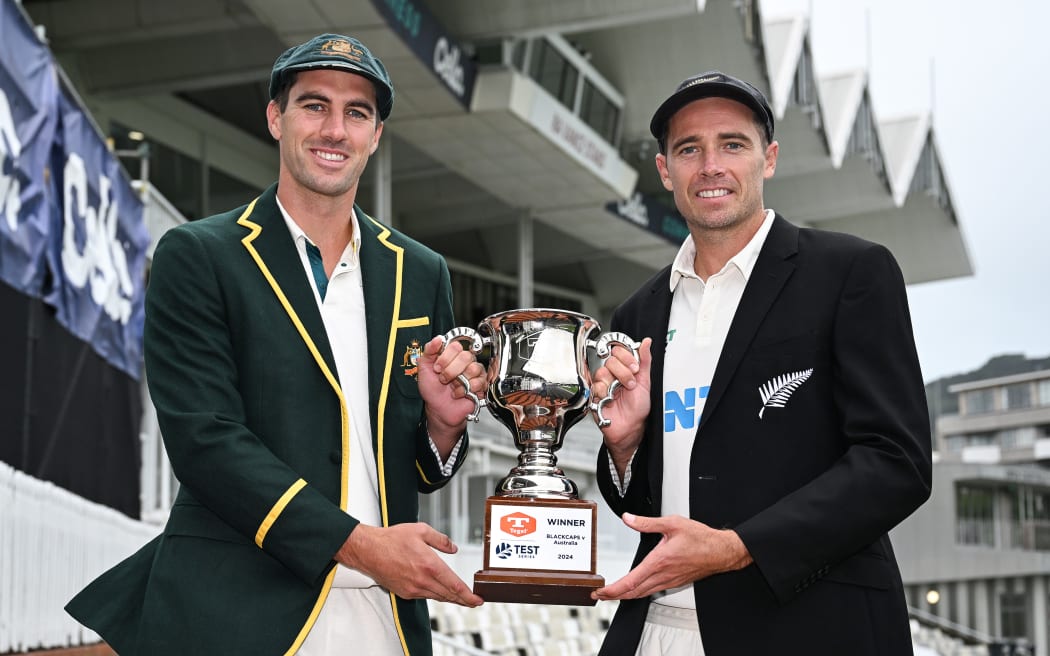 Pat Cummins and Tim Southee pose with the trophy ahead of the 2024 New Zealand Blackcaps v Australia Test Series at the Basin Reserve, 2024.