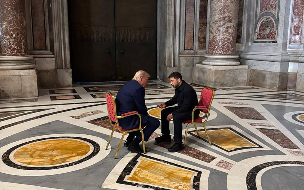 (FILES) In this handout photograph taken and posted on the official Telegram channel of Ukraine's Head of the Office of the President Andriy Yermak on April 26, 2025, Ukraine's President Volodymyr Zelensky (R) meets with US President Donald Trump (L) on the sidelines of Pope Francis's funeral at St. Peter's Basilica at the Vatican. The United States and Ukraine on April 30, 2025 signed a minerals deal after a two-month delay, in what President Donald Trump's administration called a new form of US commitment to Kyiv after the end of military aid. Ukraine said it secured key interests after protracted negotiations, including full sovereignty over its own rare earths, which are vital for new technologies and largely untapped. (Photo by Handout / Telegram /@ermaka2022 / AFP) / RESTRICTED TO EDITORIAL USE - MANDATORY CREDIT "AFP PHOTO / OFFICIAL TELEGRAM CHANNEL OF THE HEAD OF THE OFFICE OF THE PRESIDENT OF UKRAINE ANDRIY YERMAK" - NO MARKETING NO ADVERTISING CAMPAIGNS - DISTRIBUTED AS A SERVICE TO CLIENTS