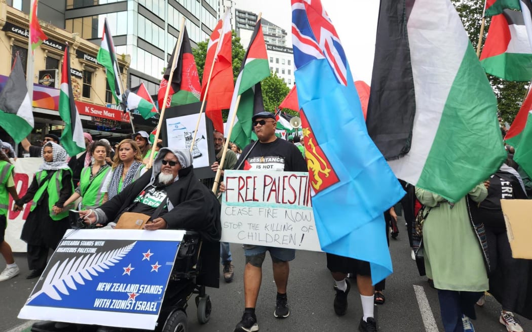 Marchers work their way down Queen Street at Sunday's protest march for a ceasefire in Israel/Gaza.
