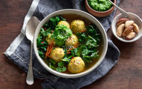 Turmeric and greens soup with chicken, quinoa and sesame dumplings