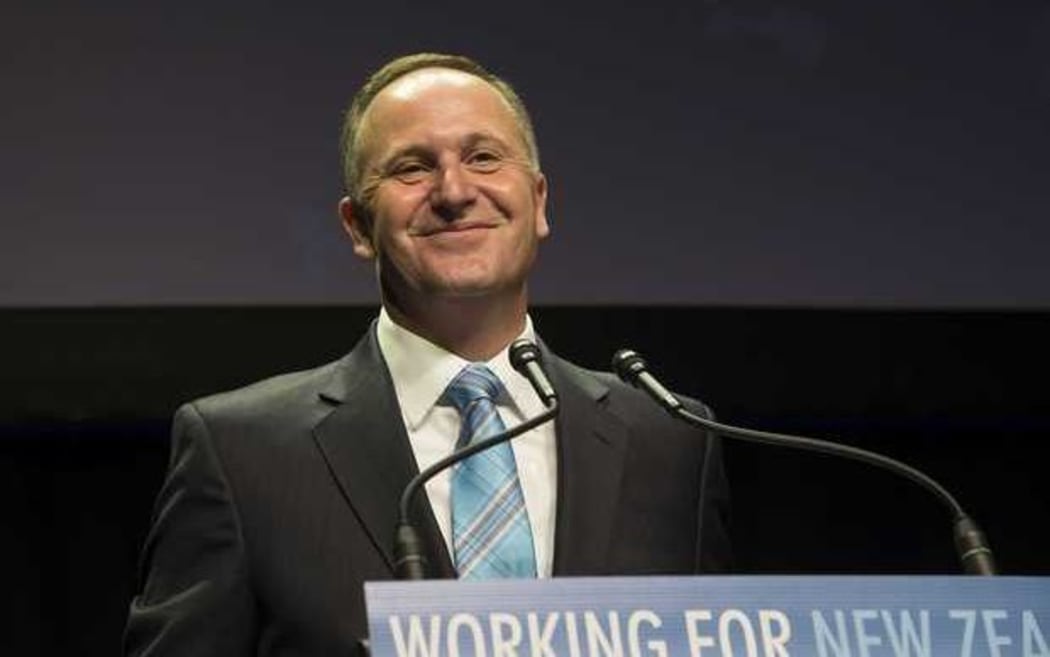 John Key takes a moment to relish his victory.