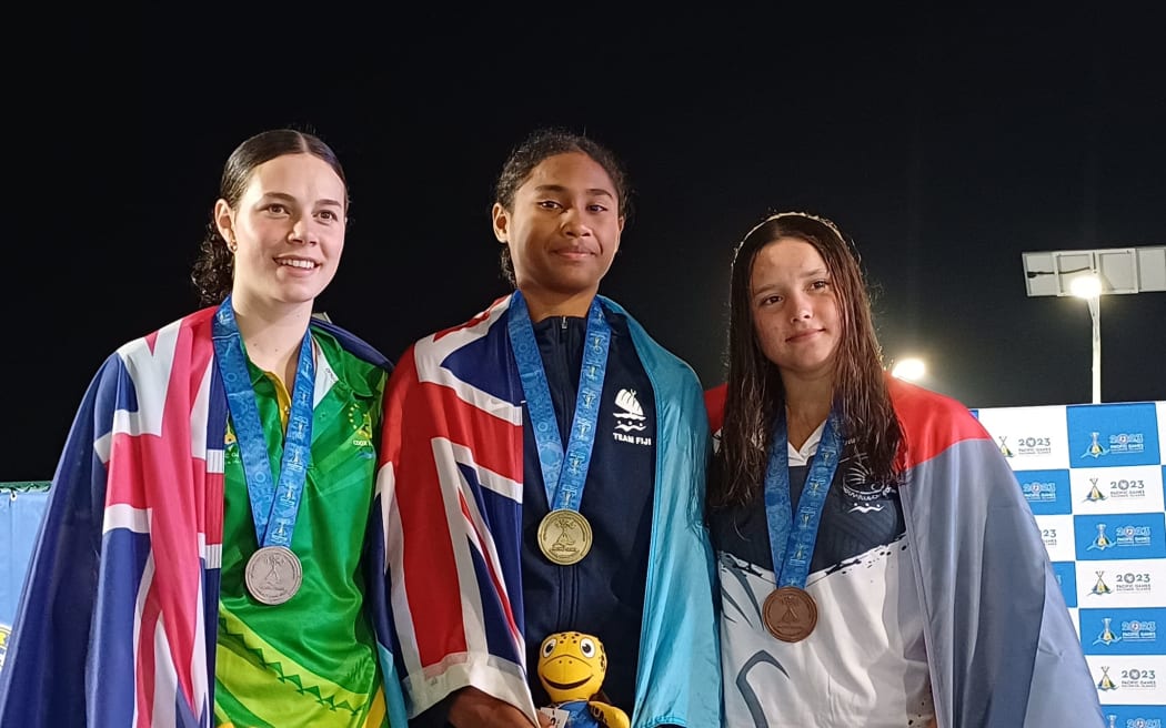Kelera Mudunasuoko (middle) with her gold medal flanked by her fellow competitors Cook Islands’ Mary Connolly and  New Caledonia’s Manon Baldovini. Photo: Team Fiji