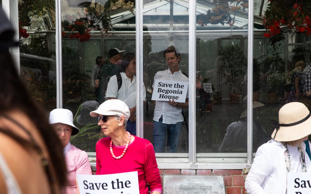 People in and outside a sit-in at Begonia House.