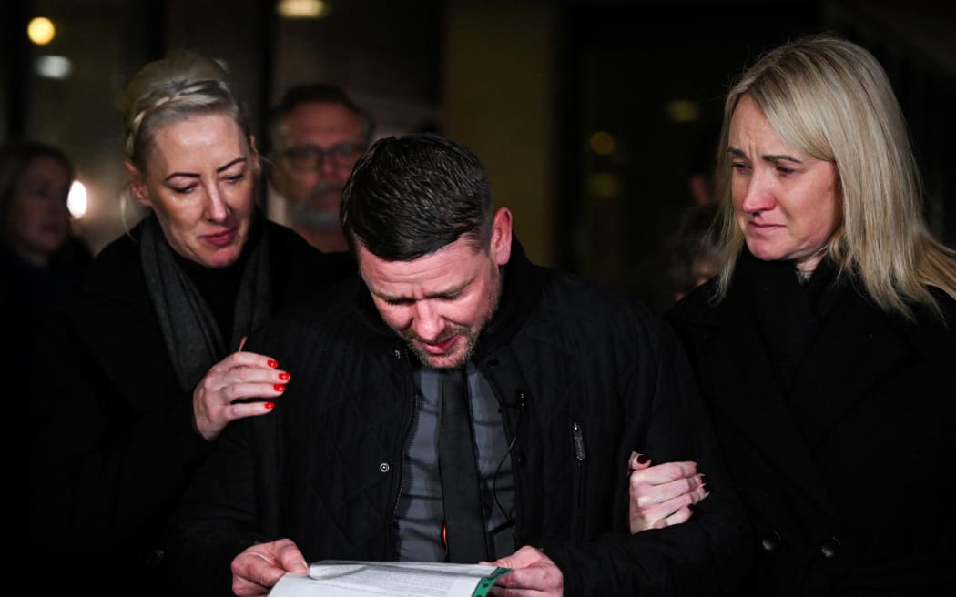 Peter Spooner, father of murdered teenager Brianna Ghey, reads a statement to the media outside of Manchester Crown Court, in Manchester, north-west England on December, 20, 2023. Two teenagers were on December 20, 2023 found guilty of the murder of 16-year-old Brianna Ghey, who was found with fatal wounds in a park in Warrington in February 2023. (Photo by Oli SCARFF / AFP)