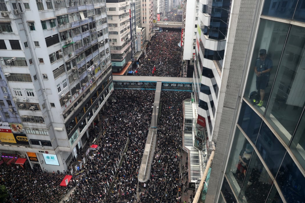 Thousands of protesters dressed in black take part in a new rally against a controversial extradition law proposal in Hong Kong on June 16, 2019.