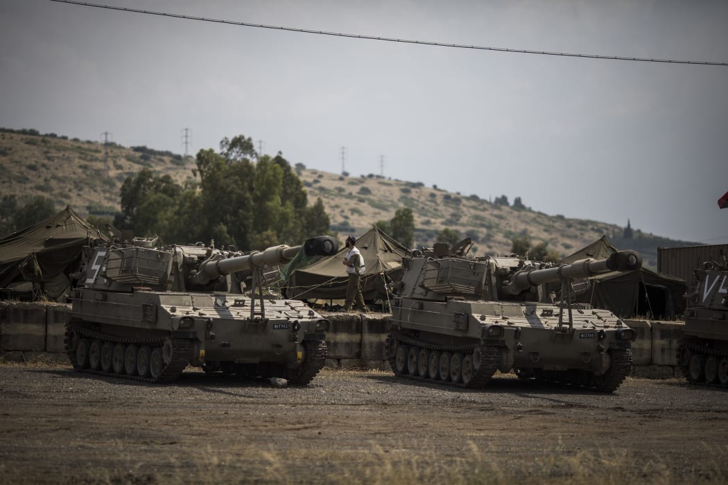 Israeli Merkava Mark IV tanks are deployed along the border with Syria, in Golan Heights, Israel, 09 May 2018.