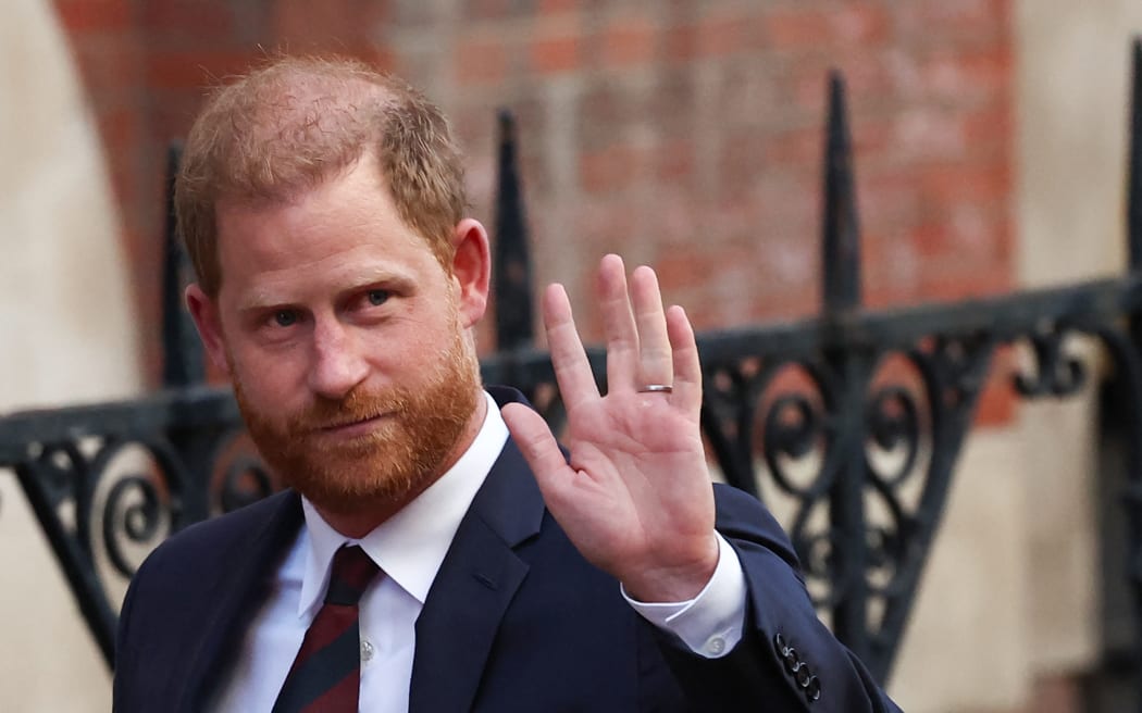 Britain's Prince Harry, Duke of Sussex waves as he departs the the Royal Courts of Justice, Britain's High Court, in central London, on 9 April, 2025 following the second day of his appeal hearing over the downgrading of his personal security during visits in Britain.