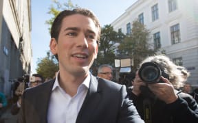 Austria's Foreign Minister and leader of of the centre-right People's Party Sebastian Kurz leaves a polling station on the weekend.