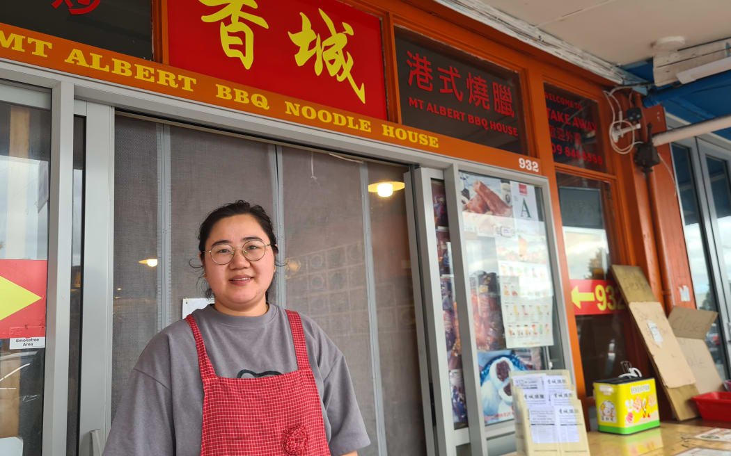 932 BBQ Noodle House manager Alice Lau stands outside the New North Road business.