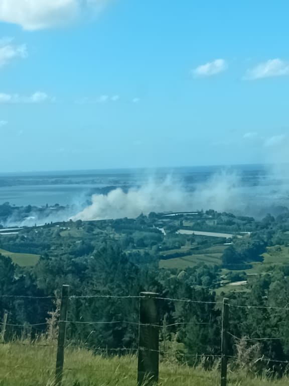 A large fire has broken out in Te Puna, Bay of Plenty, threatening homes and properties.