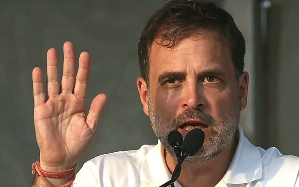 Indian National Congress (INC) Party leader Rahul Gandhi speaks during an election rally of Indian National Developmental Inclusive Alliance (INDIA) on the outskirts of Varanasi on May 28, 2024, during country's ongoing general election. (Photo by Niharika KULKARNI / AFP)