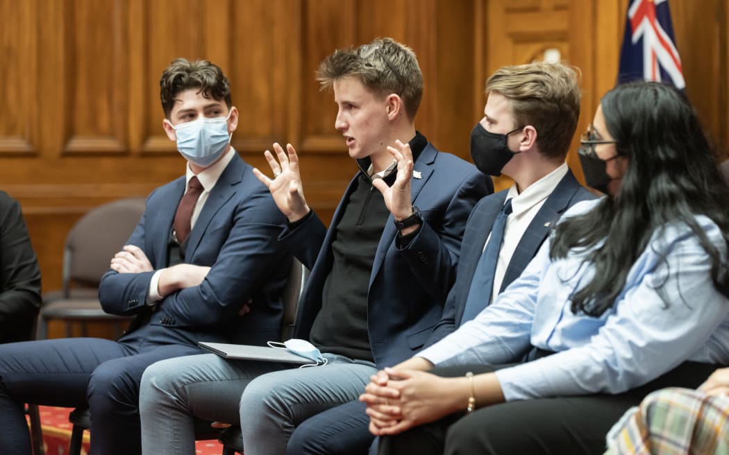 Youth MP Keelan Heesterman addresses a conference of visiting Australian and Pasifika MPs, watched by fellow Youth MPs Aidan Donoghue, Hamish Ross and Sumita Singh.
