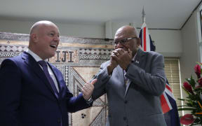 New Zealand Prime Minister Christopher Luxon and Fiji Prime Minister Sitiveni Rabuka have met ahead of their bilateral. Rabuka gave Luxon, a Crusaders fan, a Fijian Drua shirt which Luxon took in his stride. Luxon gifted Rabuka with a Hoehner harmonica, one of only three in New Zealand.