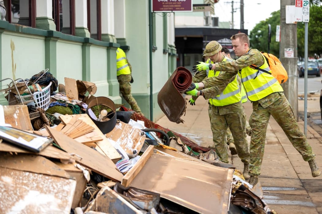 Australian Defence Force soldiers  assisting the local community of Lismore, NSW.
